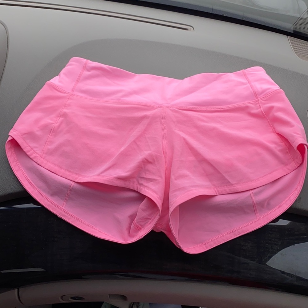 SOLD bright pink lulu speed up shorts